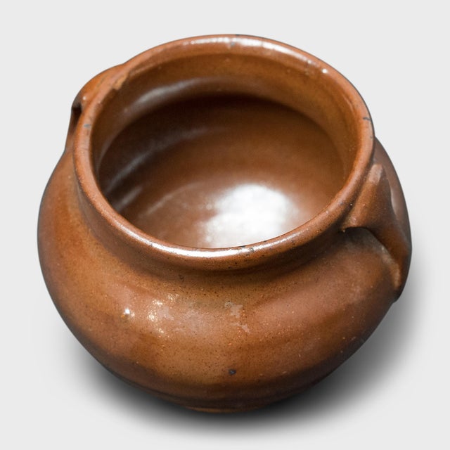 This petite glazed jar from China's Shanxi province exemplifies the timeless appeal of handcrafted pottery. Once used in...