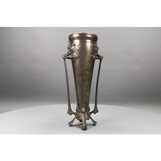 Art Nouveau Pewter Vase, Early 20th Century, France. This beautiful Art Nouveau period conical vase on 4 leaf-like feet...
