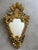 Magnificent antique mirror in the shape of cornucopias. from an unknown French manufacturer in the 1950s. In original...