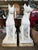 Striking in scale and execution, this pair of monumental hand-carved marble Doberman statues embodies strength, elegance,...