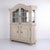 Antique display cabinet of german origin dating from the 1790s. The cabinet is crafted in original painted oak with two...