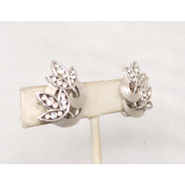 Trifari Vintage Signed Crown Trifari Rhodium Plated Clear Rhinestone Flower Clip Earrings - 2 Pieces For Sale - Image 4 of 7