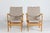 A pair of Scandinavian modern easy chairs and lounge chairs model Eva low version manufactured by Dux of Sweden. Designed...