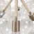 The Pelle Large Bubble Chandelier is a sculptural statement light defined by a dramatic cluster of oversized clear glass...