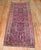 1920s Persian Sarouk small runner with a navy ground and floral design 2'6'' x 6'6'' .