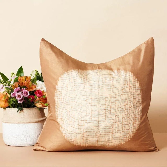 Shunya Gold pillow is luxurious and exquisite with its unique shibori print, which is handcrafted carefully to form...