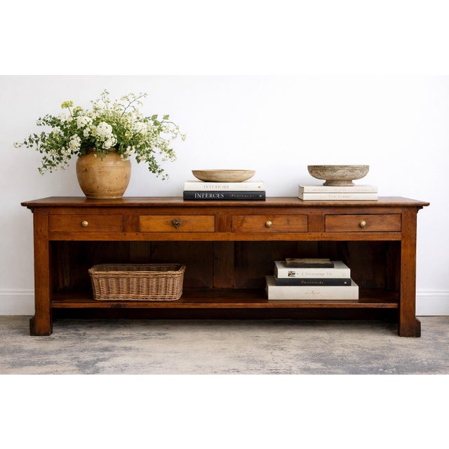 Monumental 19th-century French walnut table was sourced in Provence and exemplifies the quiet strength and practicality of...