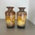 Article: Set of two fat lava art vases. Producer: Scheurich, Germany Decade: 1970s These original vintage vases was...