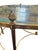Neoclassical Jansen style brass and glass elliptical coffee table having large pinecone finials, manner of Maison Baguès,...