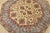 A tribal Caucasian Kazak rug hand-knotted with fine wool on a cotton foundation. This rug features geometric botanical...