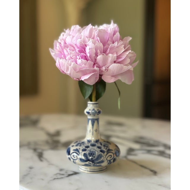 This petite, single flower vase is a collectible piece from the post-WWII revival era of Delftware production. CIRCA: 1952...