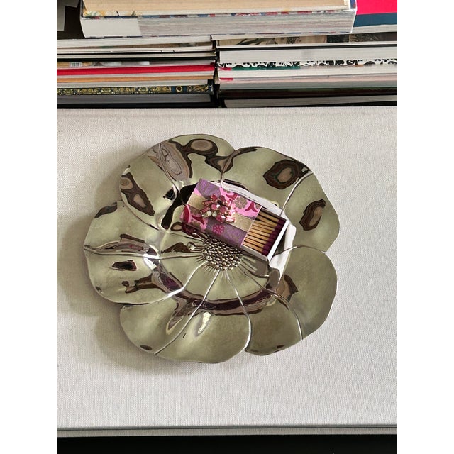 vintage silverplate flower-form dish with sculptural petals, raised veining, and a detailed beaded center. The shallow...
