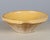 An early 20th century Country French yellow glazed earthenware pottery tian or grésale bowl. Originating from Provence and...