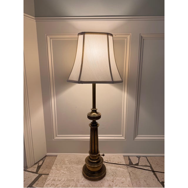 Introduce a touch of understated luxury and classic proportion to your home with this elegant vintage table lamp by the...