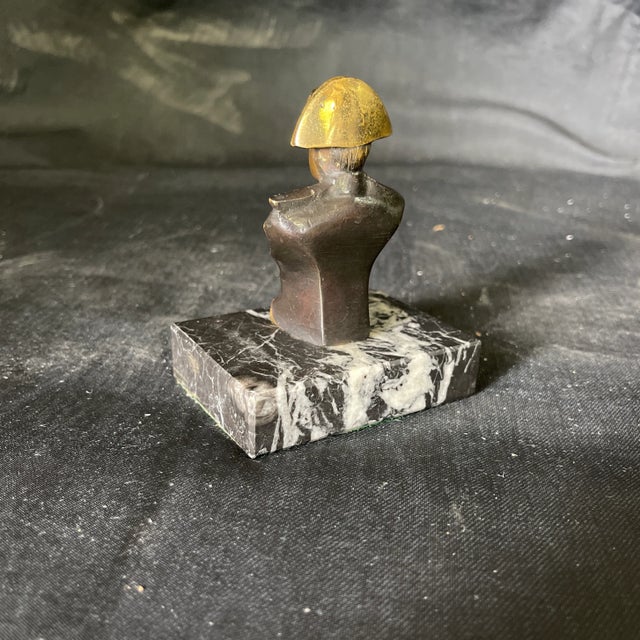 Decorative Statue depicting bust of Napoleon entitled Waterloo, made of brass on a black and white marble base. Great desk...