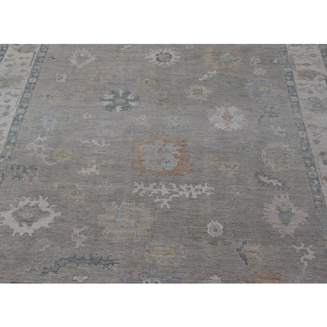 All-Over Floral Modern Oushak With Light Tan Background and Cream Border For Sale - Image 4 of 12