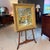 Beautifully framed oil on canvas painting featuring a spray of colorful flowers in a blue and white vase. Excellent...