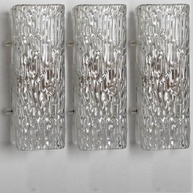 One of the three light fixtures by j.t. Kalmar, vienna, austria, manufactured in circa 1960. The glass shows a beautiful...