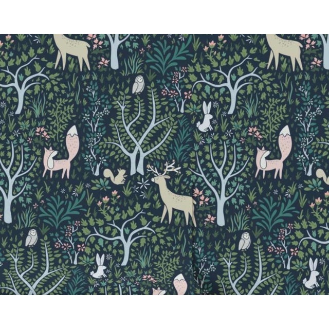 This is a luxury wallpaper featuring a whimsical woodland scene with deer, foxes, rabbits, owls, and delicate foliage...