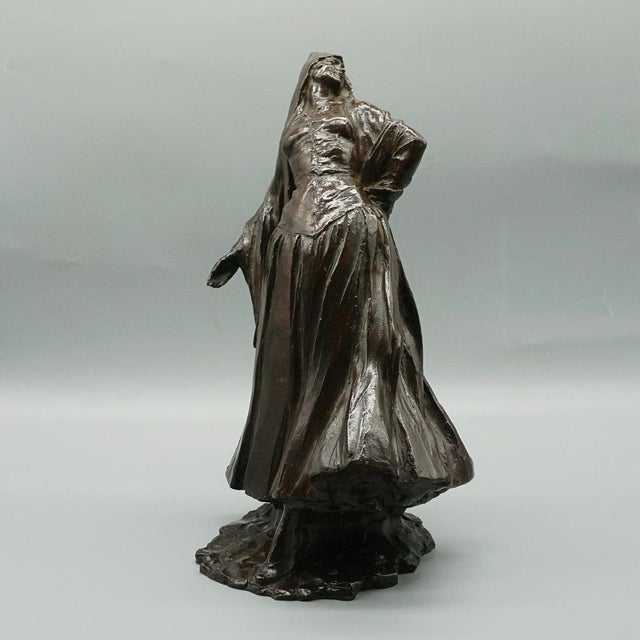 A patinated bronze figure of a spanish dancer in classical dress. Signed to base with batardy foundarie (1925 - 1945)...
