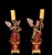 A charming pair of Spanish Baroque angel torchères dating from the 18th century, carved in wood and richly polychromed....