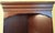 Elevate an underutilized corner with this stately traditional corner cabinet by renowned American manufacturer Hooker...