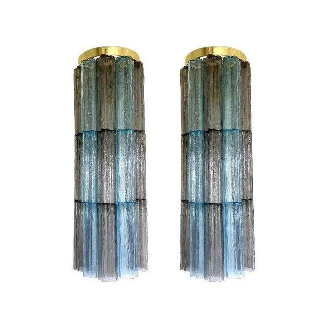 Contemporary and impressive multicolor “tronchi” wall sconces. a pair of luxury and scenographic wall sconces made in...