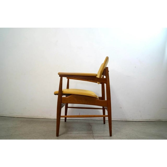 Vintage original Midcentury Modern armchair for sale. Manufactured in the 1950’s by Thonet, and still has the original tag...