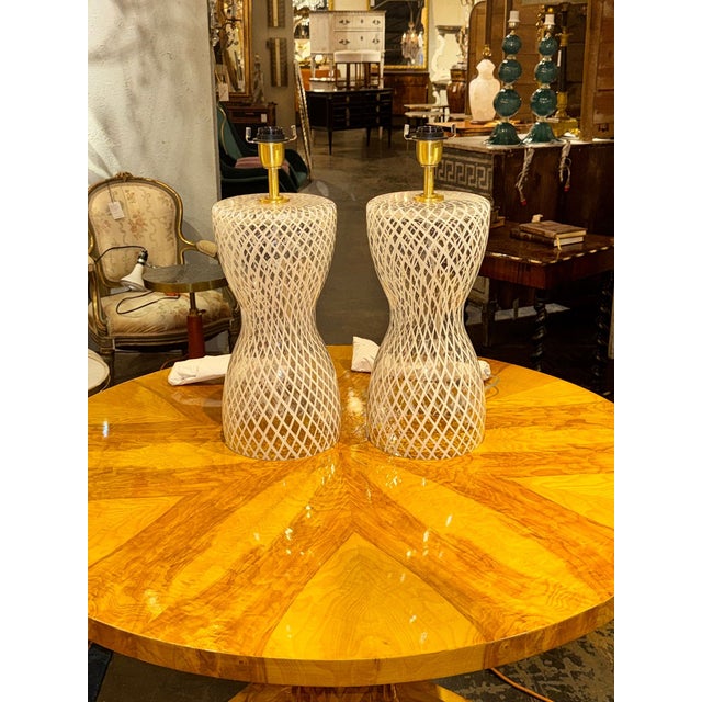 These vintage Murano glass lattice lamps are a unique and elegant addition to any home. or garden space. Created by...