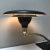 Black and brass “Sight Light” desk lamp designed by Leroy Doane in the 1950s for the M.G. Wheeler Co. The lamp features a...