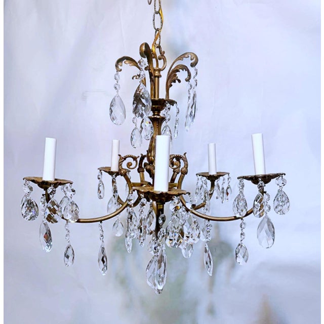 This is a decorative Spanish brass chandelier with 30% leaded Swedish cut drop crystal and octagon chain. The chandelier...