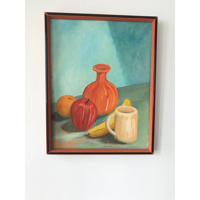 Colorful still life in orange frame with gloss black inlays. Just that pop of color a room needs. Painting depicts orange-...