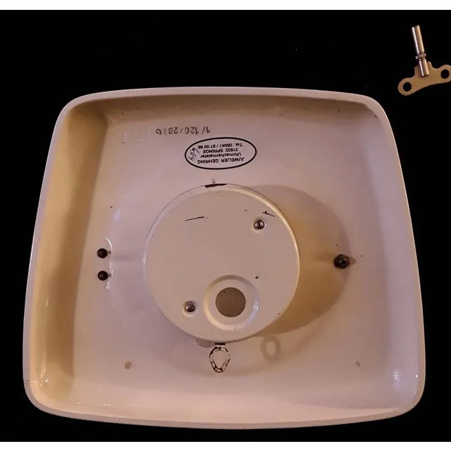 Mid-Century German Machanical Wall Club Clock in Cream-Colored Ceramic with Yellow-Blue Decor from Mauthe, 1950s For Sale - Image 4 of 5