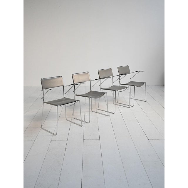"Spaghetti" chairs by Giandomenico Belotti for Alias, an icon of 1970s Italian design. Set of four "Spaghetti" chairs,...