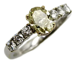 Late 20th Century 18k Gold Oval Yellow Diamond and Diamond Ring Size 6