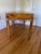 Very chic writing desk with two drawers with campaign style pulls. The olive wood gives it life. The boxy rectangular...