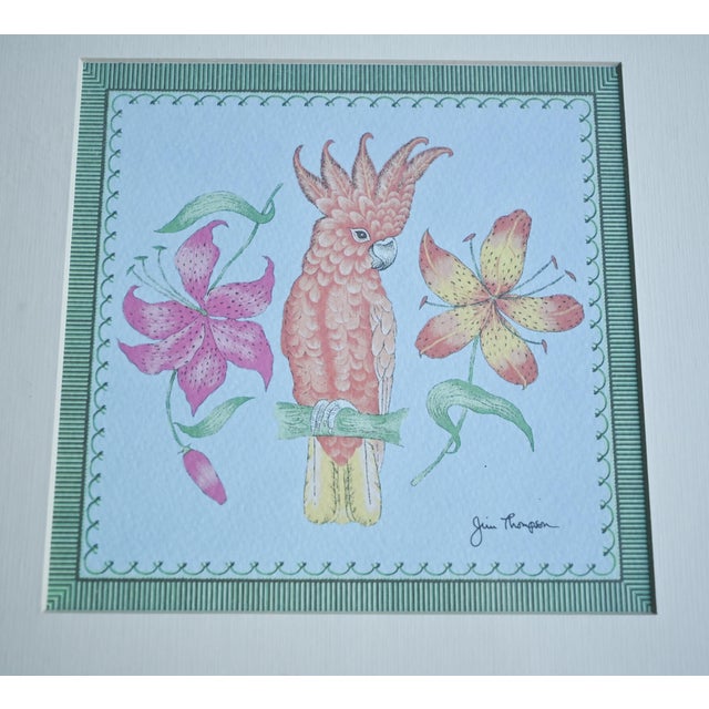 These vintage Jim Thompson prints feature colorful cockatoos, a common subject for him. They are framed as a pair of...