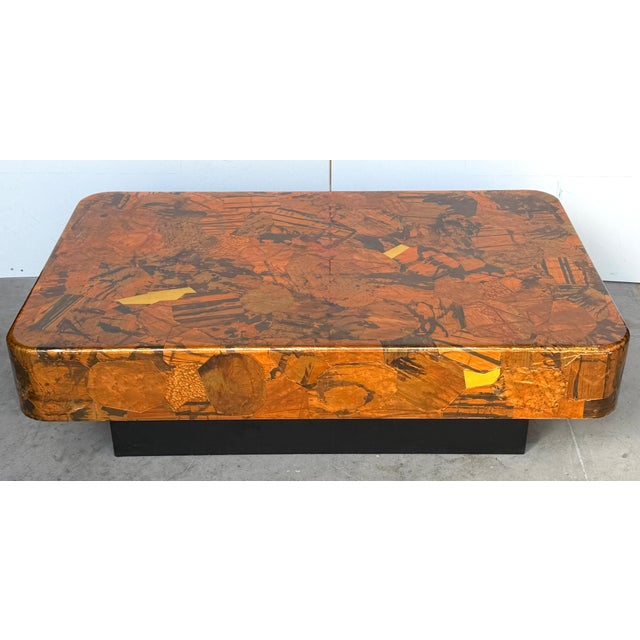 1970s Inlaid Organic Modern Copper & Brass Inlaid Coffee Table This good-sized organic modern coffee table, dating to the...