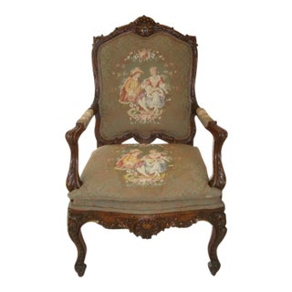 Ornate French Louis XV–Style Carved Wood Armchair With Floral Tapestry Upholstery For Sale