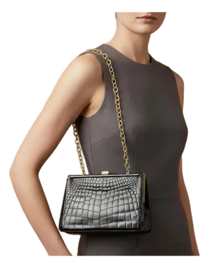 An Elegant 1950s Retro Black Leather and Brass Italian Shoulder Bag
