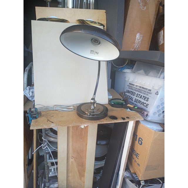 This desk lamp is in the Bauhas style it is a well made heavy lamp made in the 1980s this one is in good condition with no...