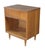An antique 1960s Mid Century Modern Walnut night stand. Features a rectangular form with a laminate top and dovetailed...