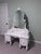 Sweet shabby chic vanity. Four working drawers provide nice storage. Large mirror is perfect for getting ready in front of...