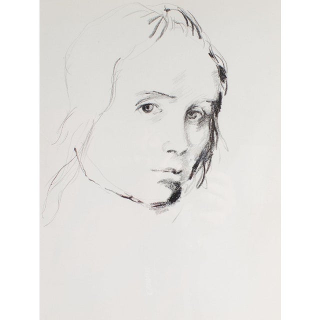 A charcoal portrait drawing by the American artist James L. Bruch (1942-2023). This portrait depicts a figure with...