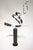 Stunning stainless steel “swirl” floor sculpture by Curtis Jere. Swirl sits atop a painted black steel base and swivels,...