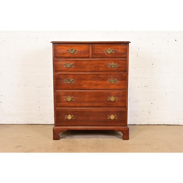A gorgeous American Colonial, Georgian, or Chippendale style six-drawer highboy dresser or chest of drawers By Henkel...