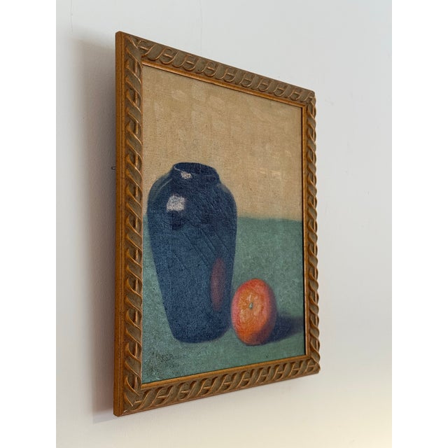 This is a lovely framed still life with orange and vase signed “S.S. Peschau 3/23/32” on canvas.