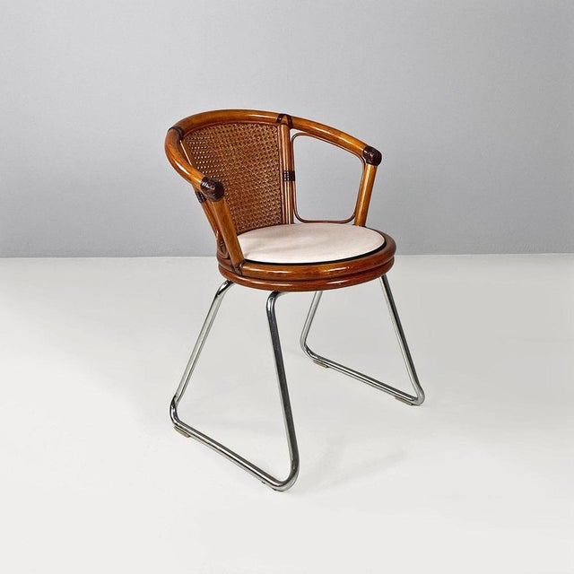 Cockpit chair, modern Italian, made of vienna straw wood and steel, ca. 1970. Cockpit chair, with Vienna straw seat and...