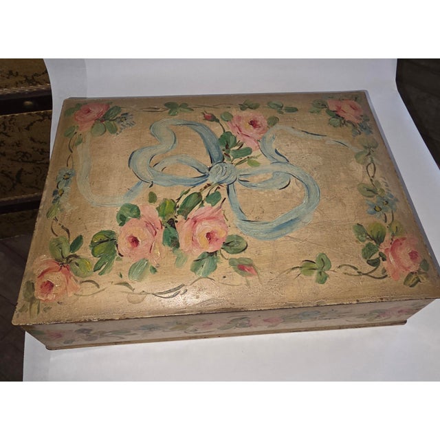Charming antique biscuit box that was hand painted long ago. This has a wonderful patina and is perfect for any room.