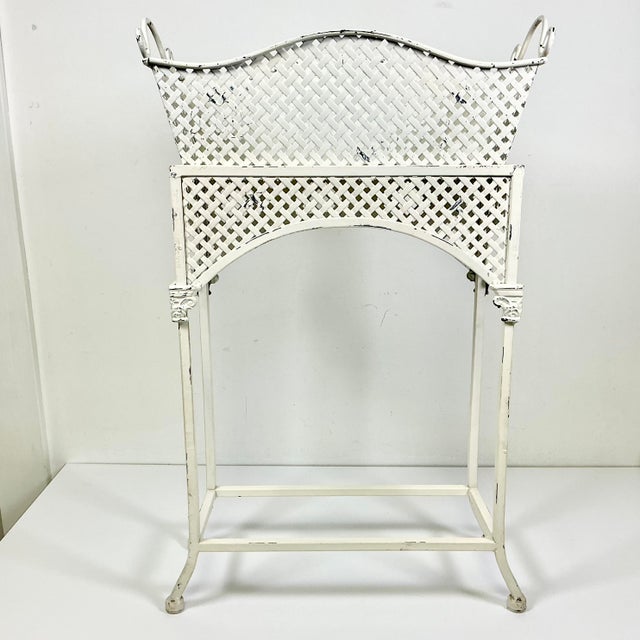 This is a lovely tole metal 2 piece Plant Stand. The design features a flat bar lattice in a distressed ivory. The...